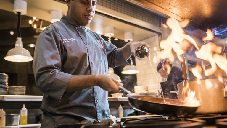 A chef cooking delicious food 