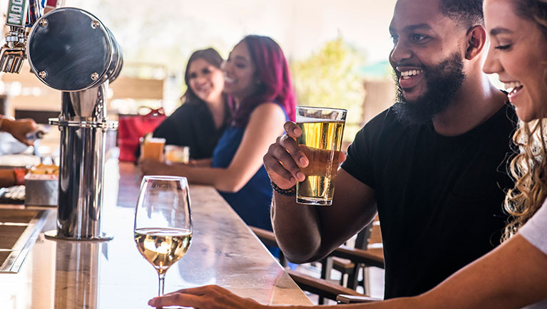 Couple enjoys beers 