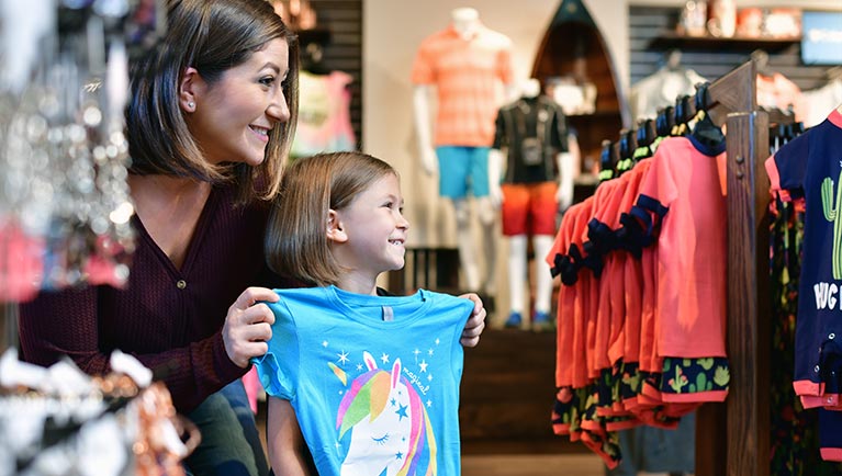 A mother with her daughter look at items available at  Buckhorn Exchange at Great Wolf Lodge indoor water park and resort.