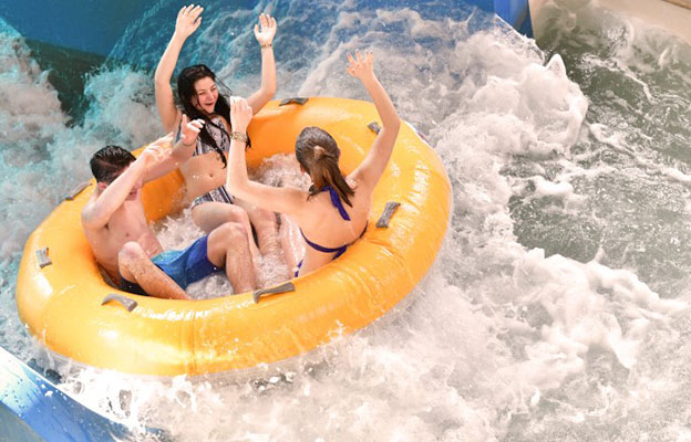 Guests enjoying a tube ride in the water park