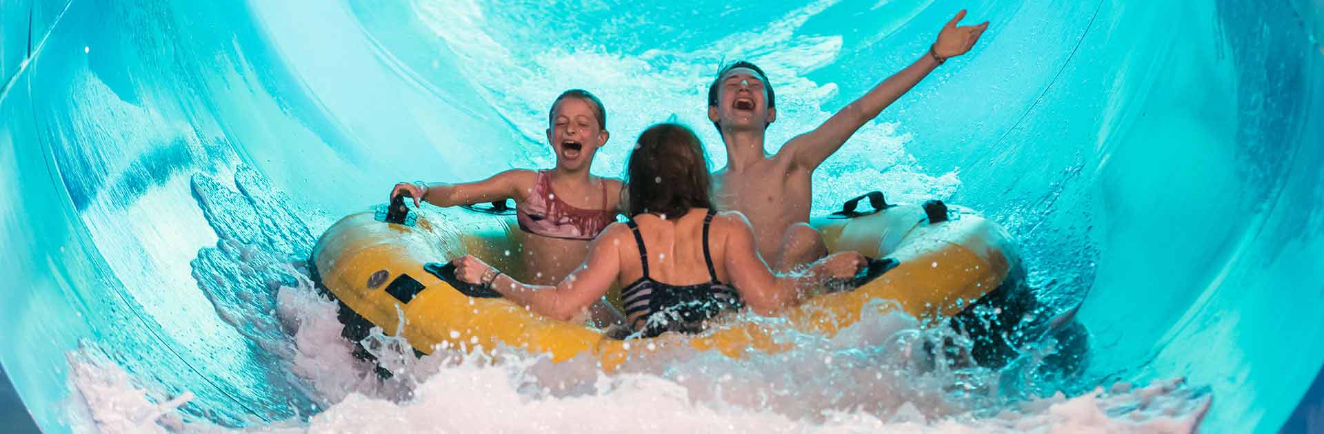 Kids enjoying a water slide