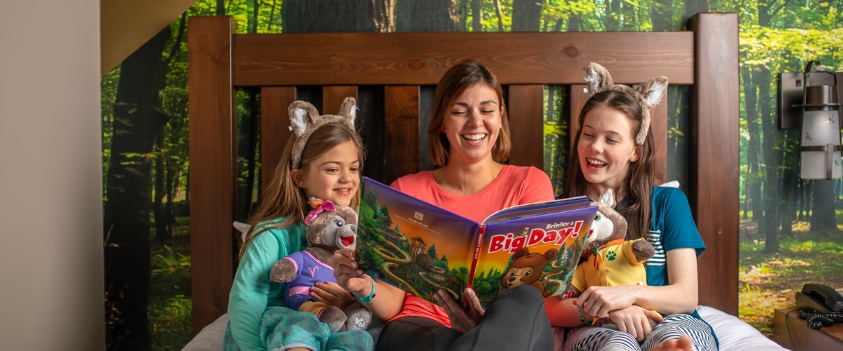Guests enjoying a bed time story at the great wolf lodge