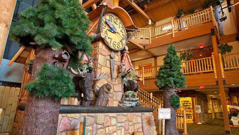 Children sit and watch the Great Clock Tower show