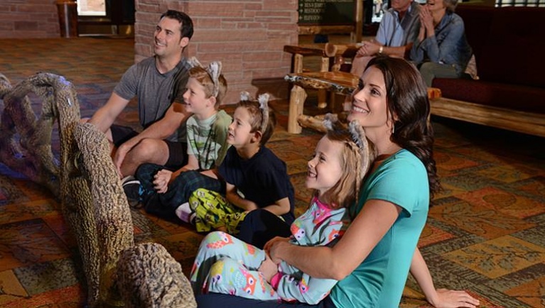 families interact as they watch the show 