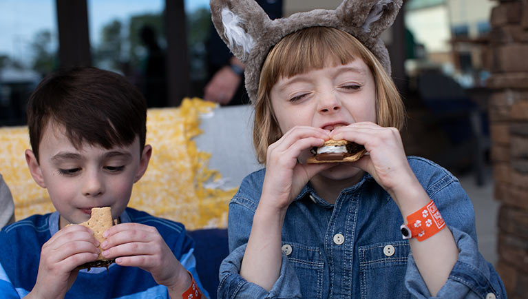 kids enjoying S'Mores treat