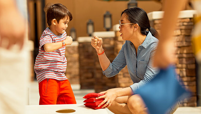 kid and mom playing games