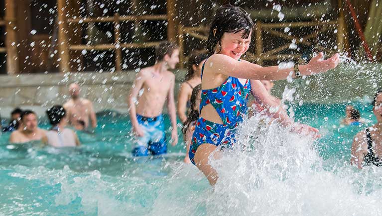 girl exercising in a pool