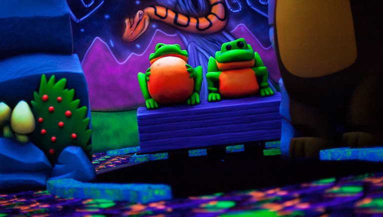 A pair of frogs found at Howl at the Moon Glow Golf at Great Wolf Lodge indoor water park and resort.