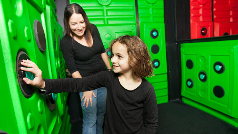 A mother and daughter take on Oliver's Time Challenge at at Great Wolf Lodge indoor water park and resort.