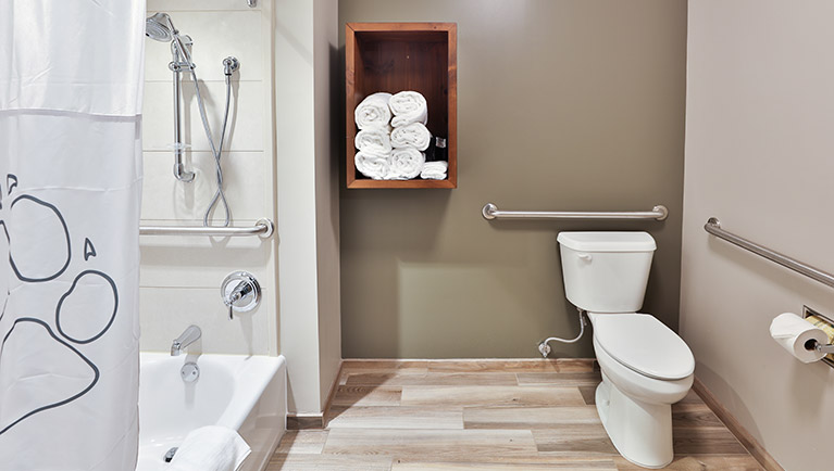 The bathroom in the Accessible Loft Fireplace Suite