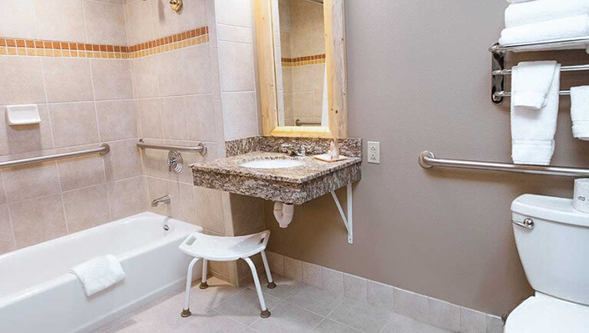 The bathroon in the the accessible Royal Bear Suite