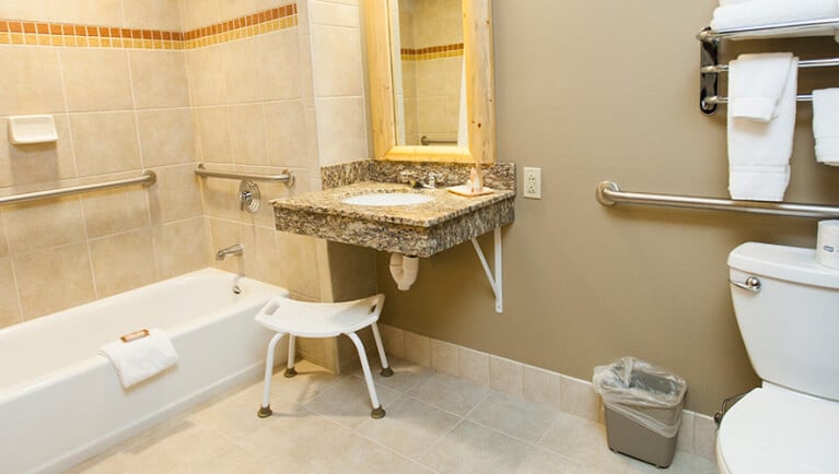The bathroom in the Royal Bear Suite (Accessible bathtub)