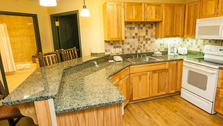 The full kitchen in the Great Frontier Loft Condo