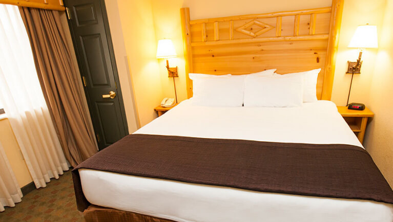 The California king bed in the Great Frontier Loft Condo