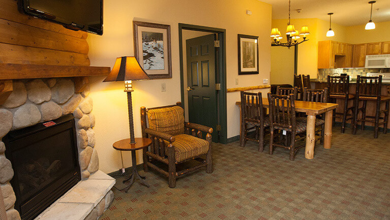 The living area and kitchen in the Timber Wolf Condo