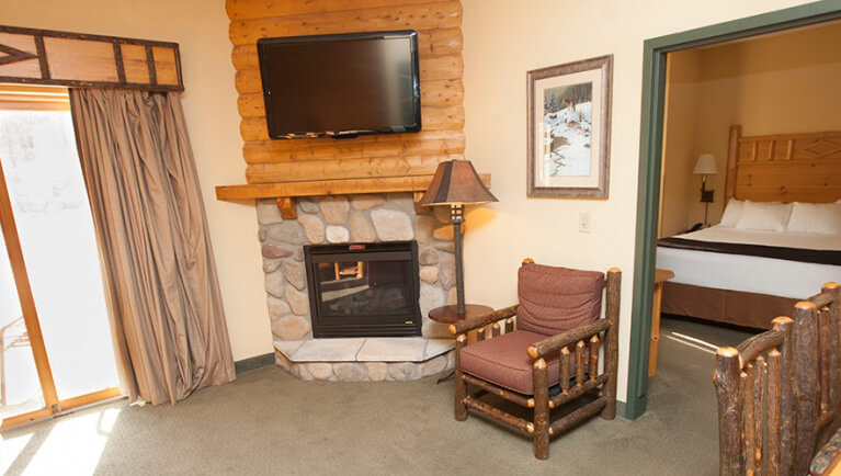 The fireplace and TV in the Wolf Pack Loft Condo
