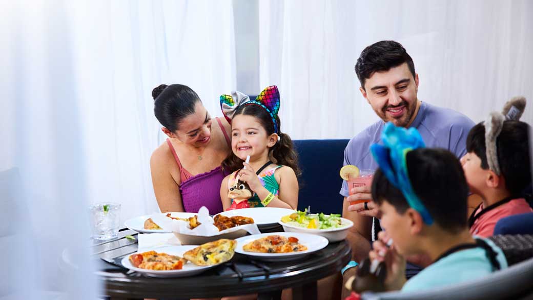 Family enjoying food in cabana