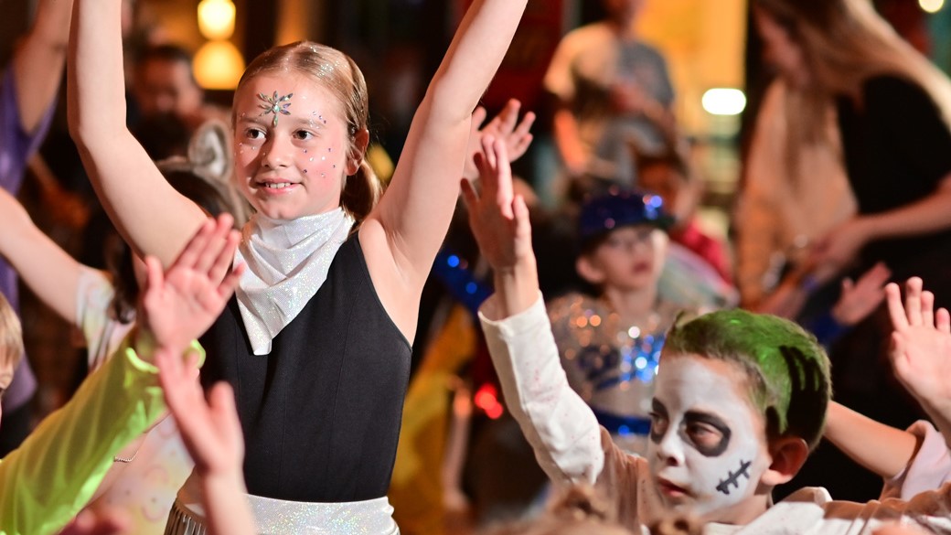 Kids dancing in Halloween dance party