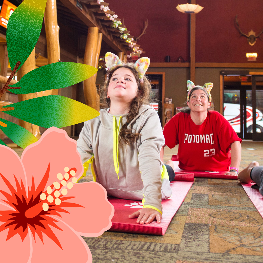 Two kids stretching during yoga activity