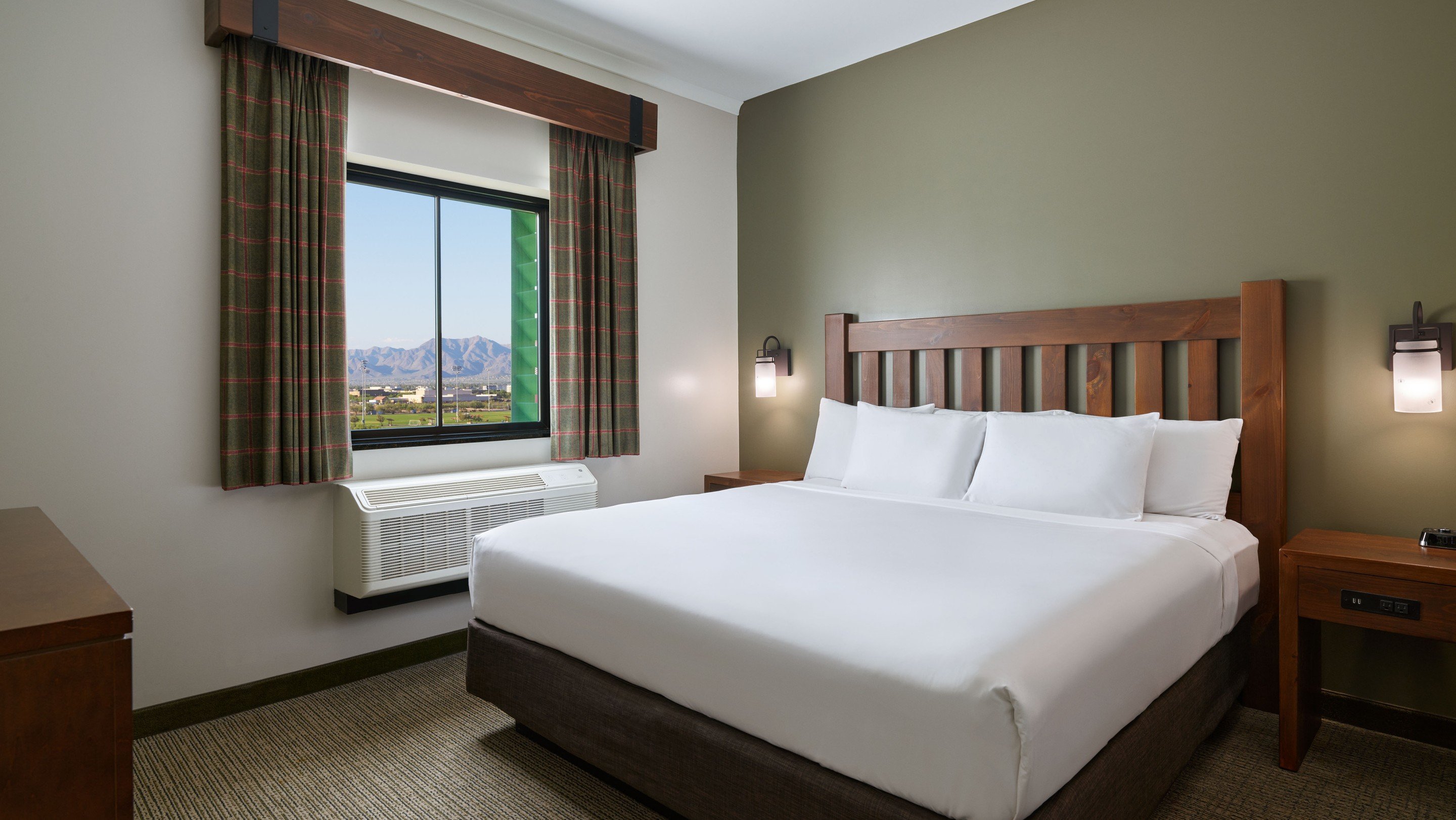 The king bed in the Grizzly Bear Suite