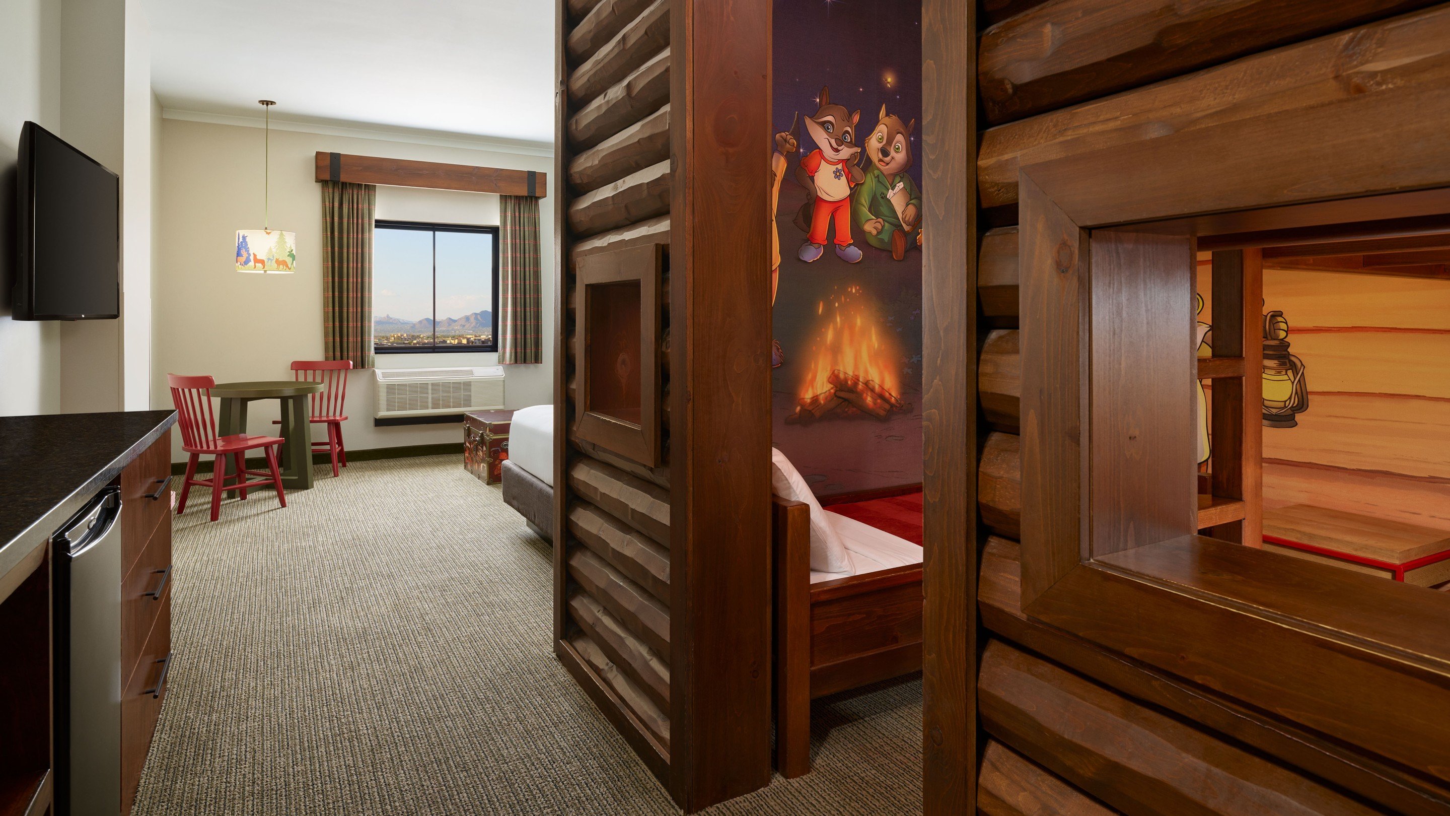 The bed and sofa in the KidCabin Suite