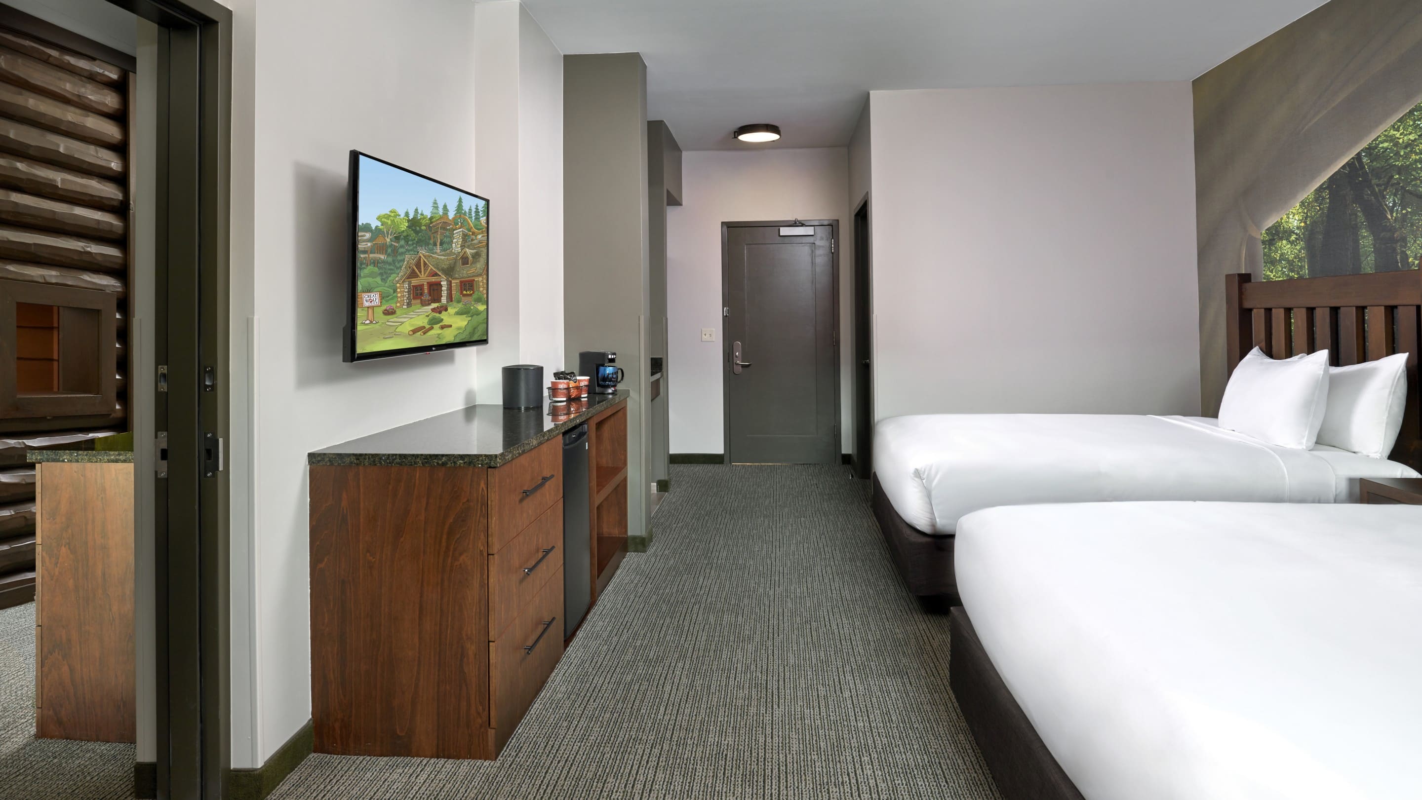 The beds in the accessible Deluxe KidCabin Suite