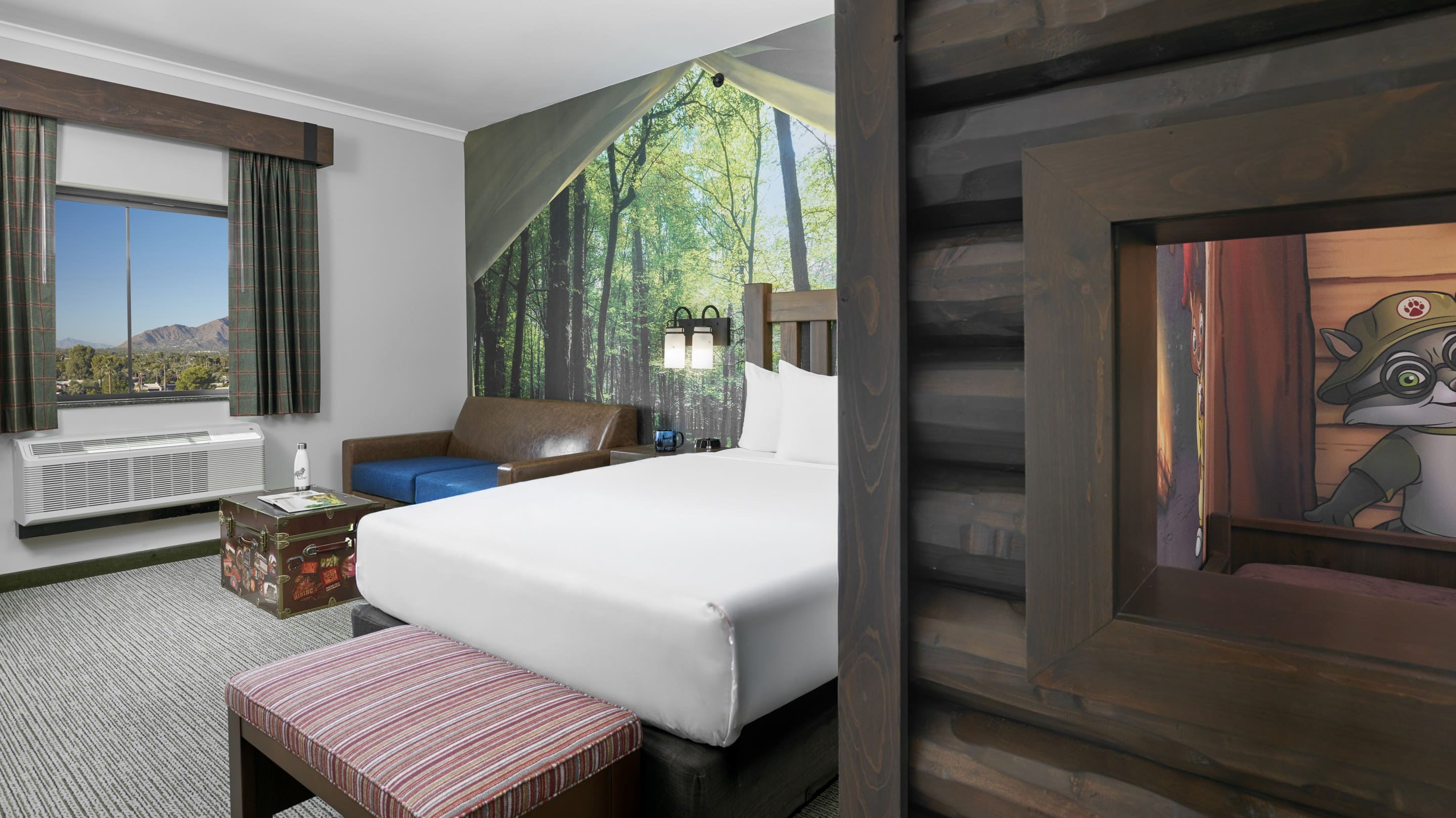 The bed in the accessible Deluxe KidCabin Suite