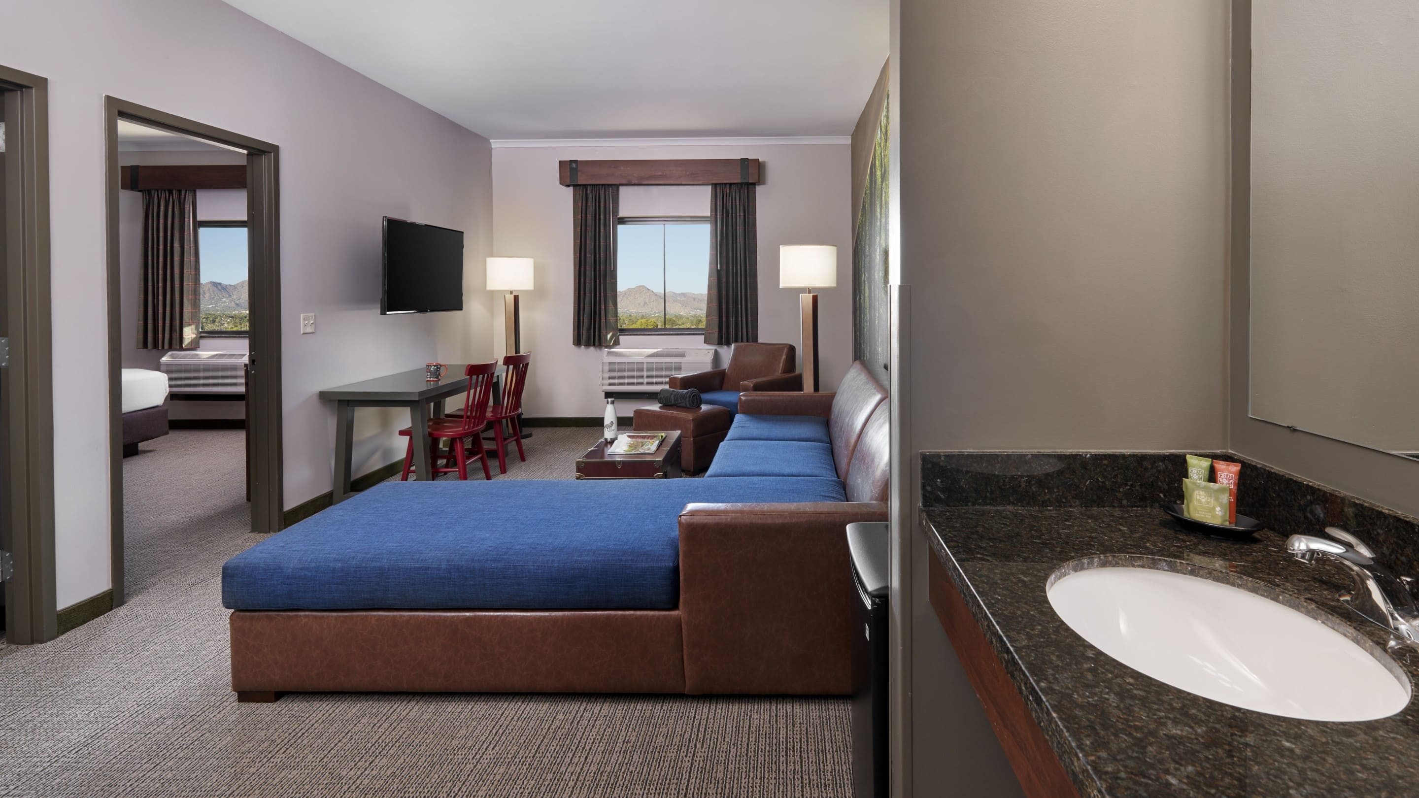 The couches and chair in the accessible Grizzly Bear Suite