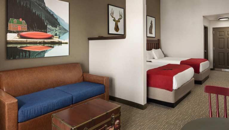 The sofa and beds in the Grand Royal Bear Suite