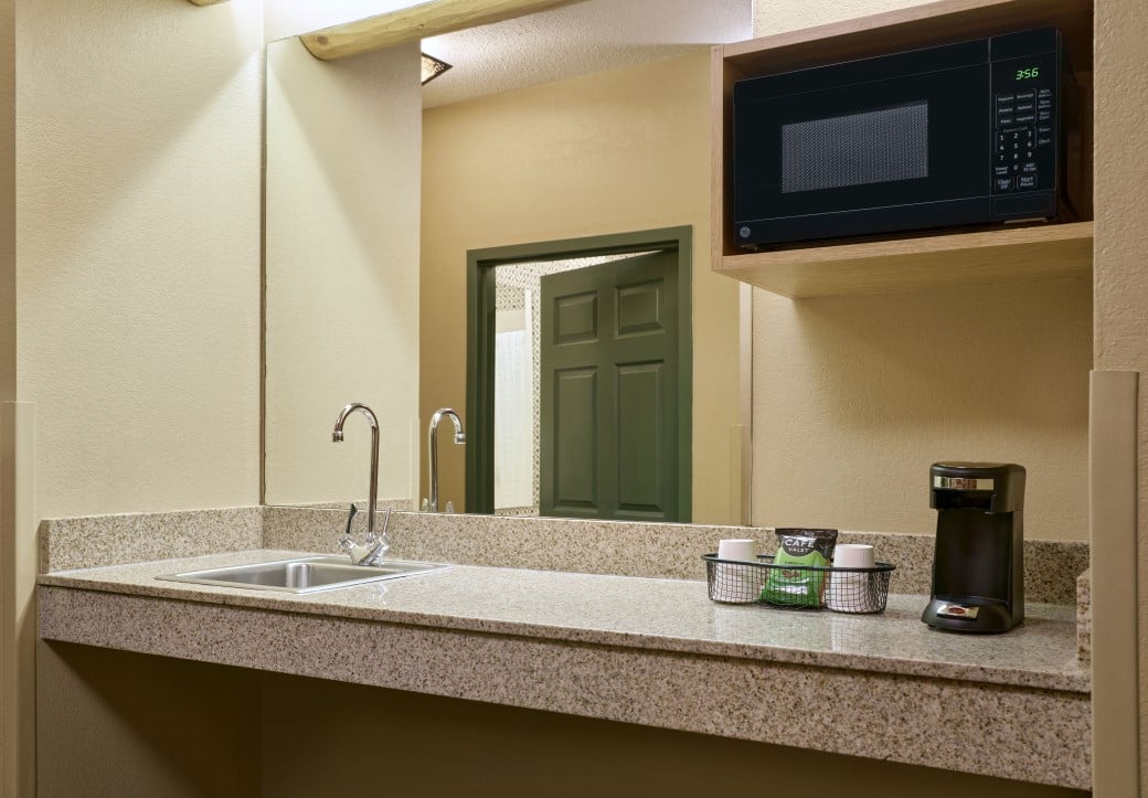 The sink area in the Deluxe Wolf Den Suite