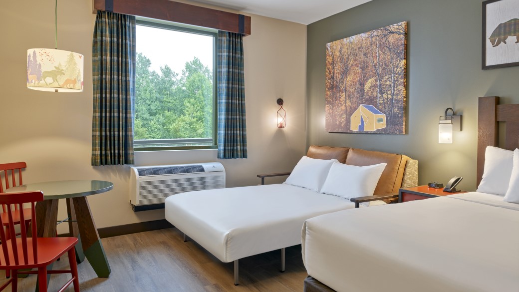 Sofa bed of the Accessible Bathtub Deluxe Queen Suite