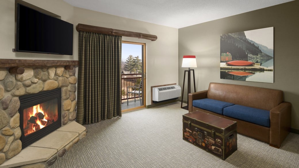 Fireplace and TV area in the Family Fireplace Suite (Patio)