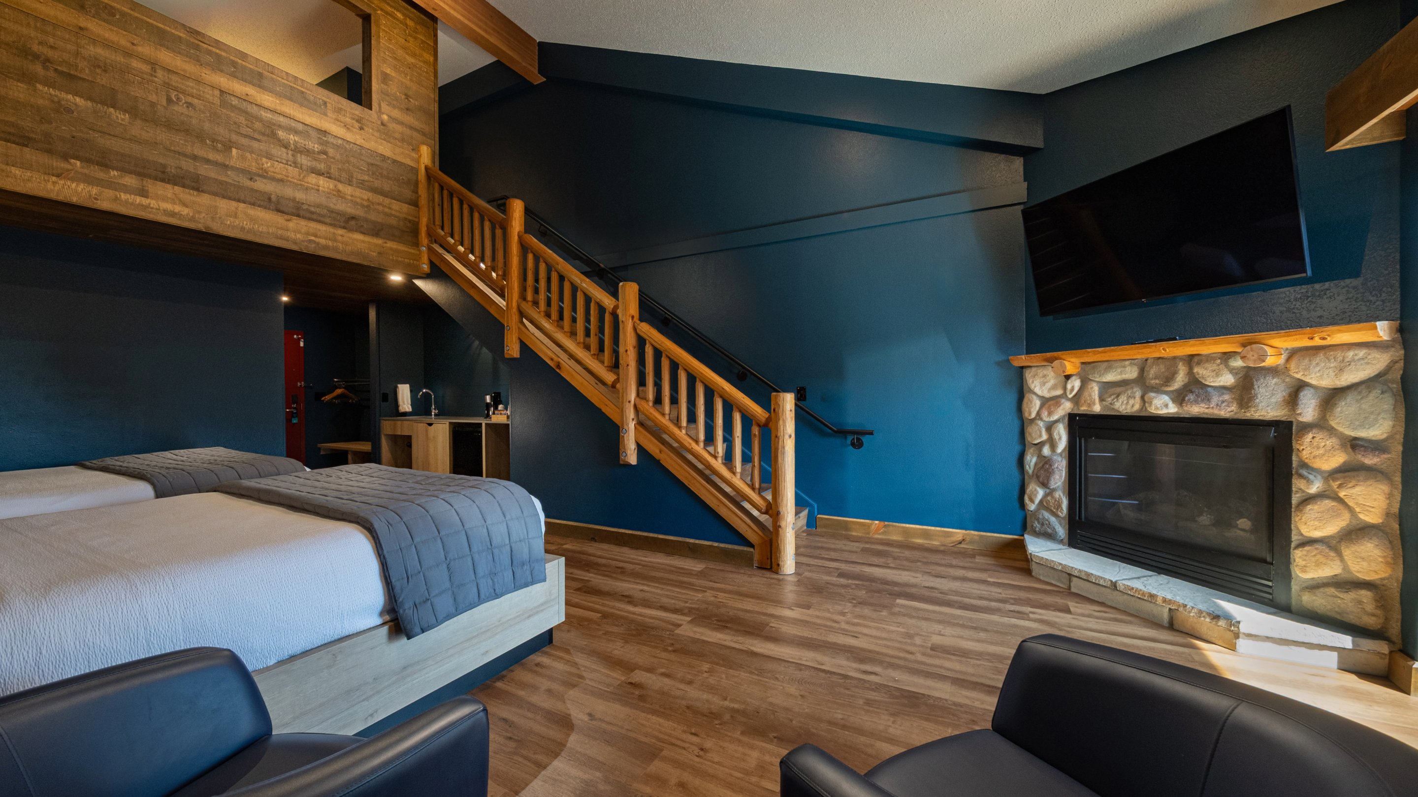 View of fireplace and room in the Loft suite