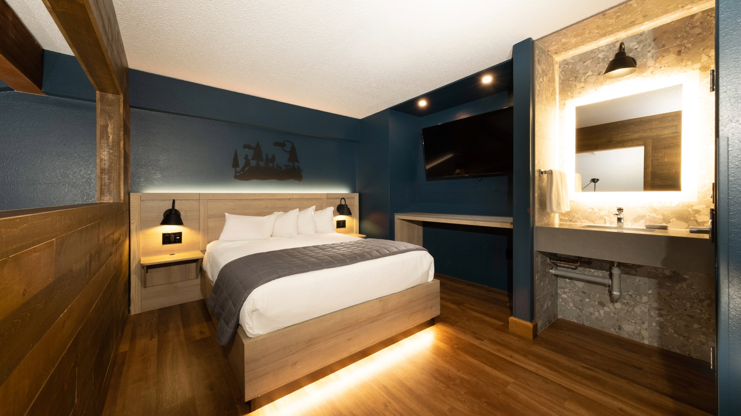 The bed upstairs in the accessible Loft Fireplace Suite