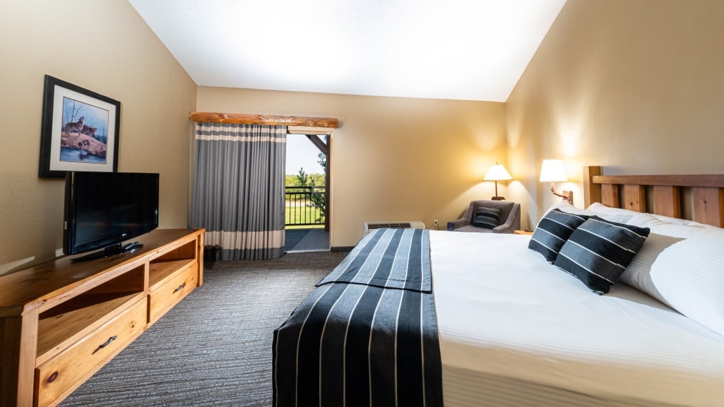 King sized bed at the Majestic Bear Suite in GWL ON
