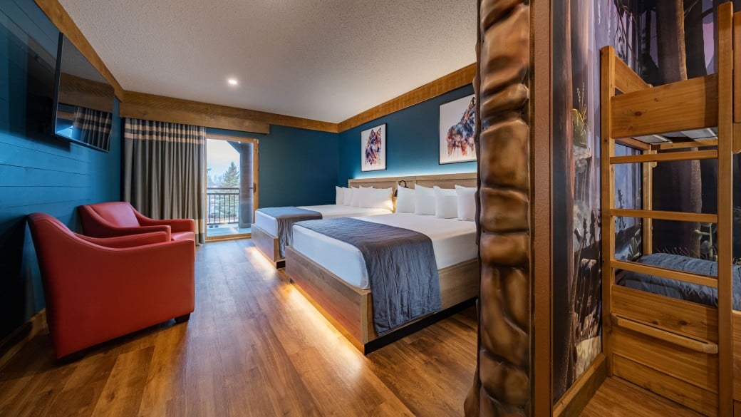 Queen bed in the Wolf Den Suite