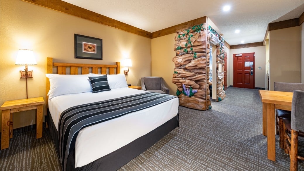 The bed and indoor cabin with bunk beds in the accessible Wolf Den Suite at Great Wolf Lodge NIagara Falls, ON.