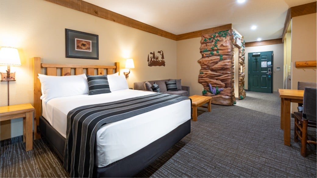 Queen bed in the Wolf Den Suite