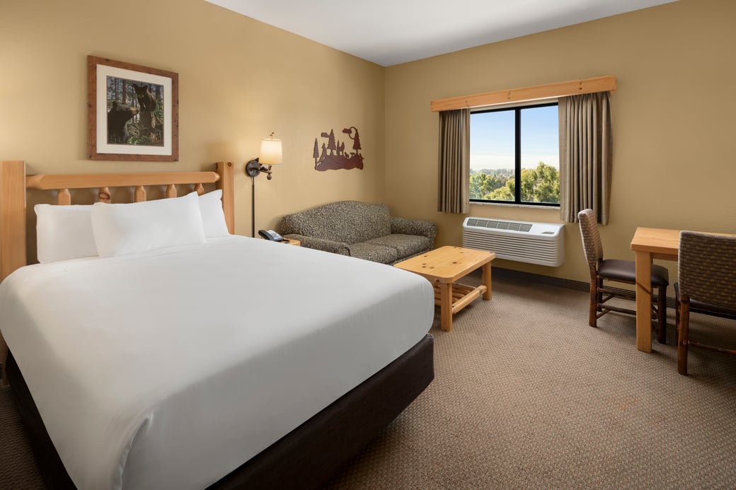 The Queen bed in the KidCabin Suite (Acc Bathtub)