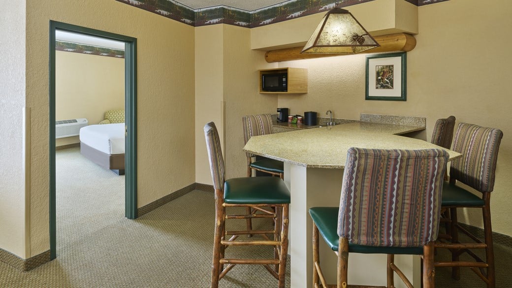 The beds and living area Majestic Bear Suite