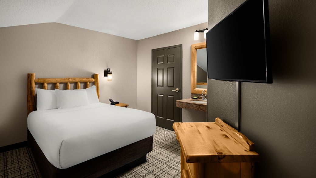 The California king bed in the Great Frontier Loft Condo