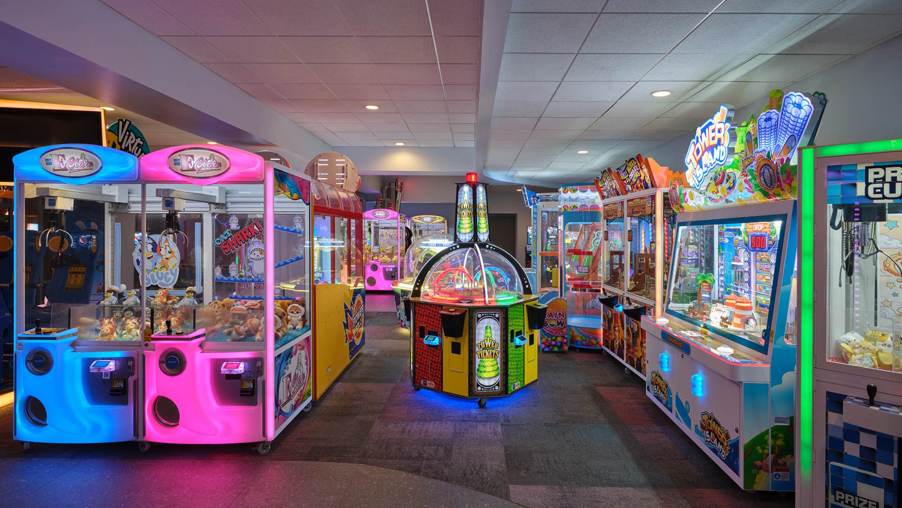 Arcade with claw machines and prizes