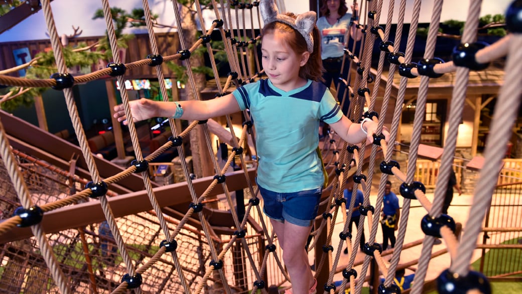 Little walking on an indoor rope course