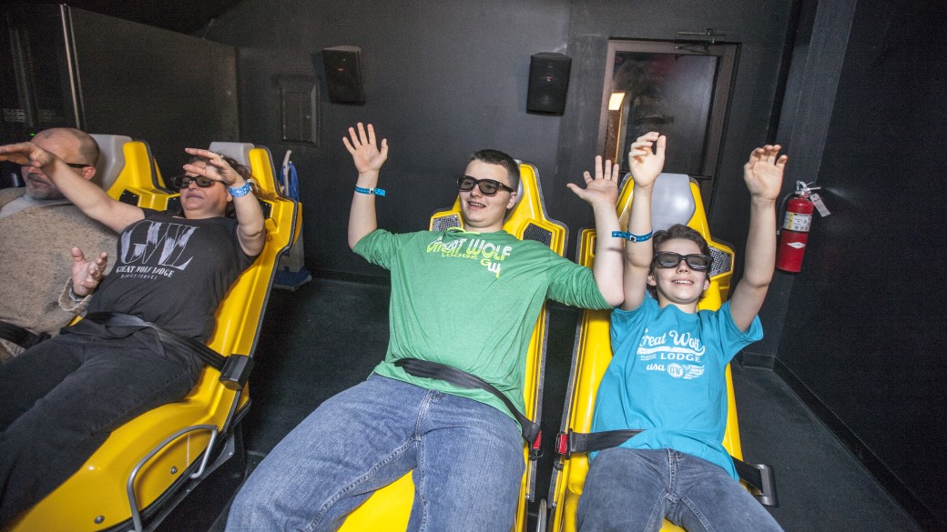 Family enjoying Howlywood XD theatre