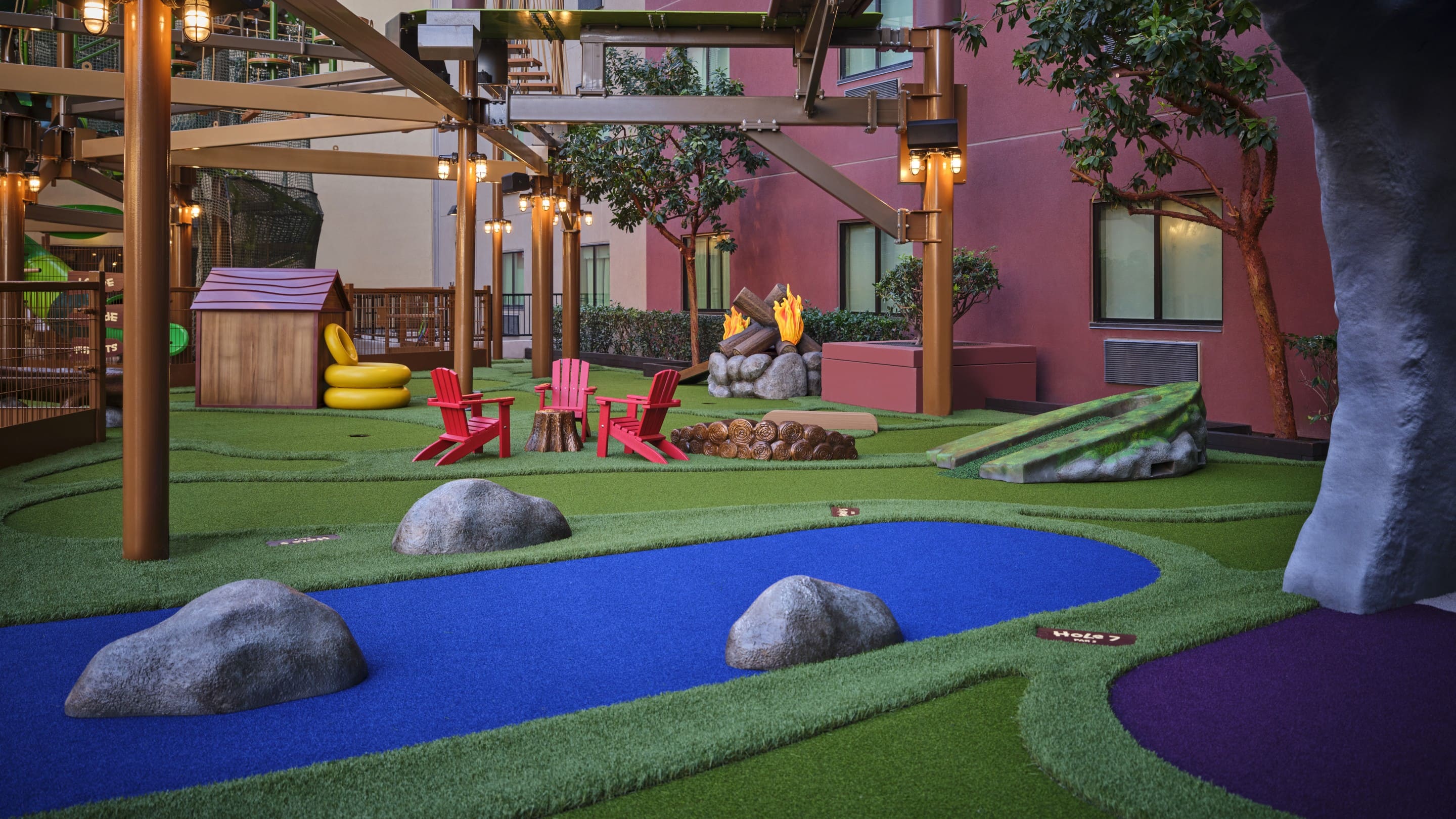 Soft-surface playground with colorful structures