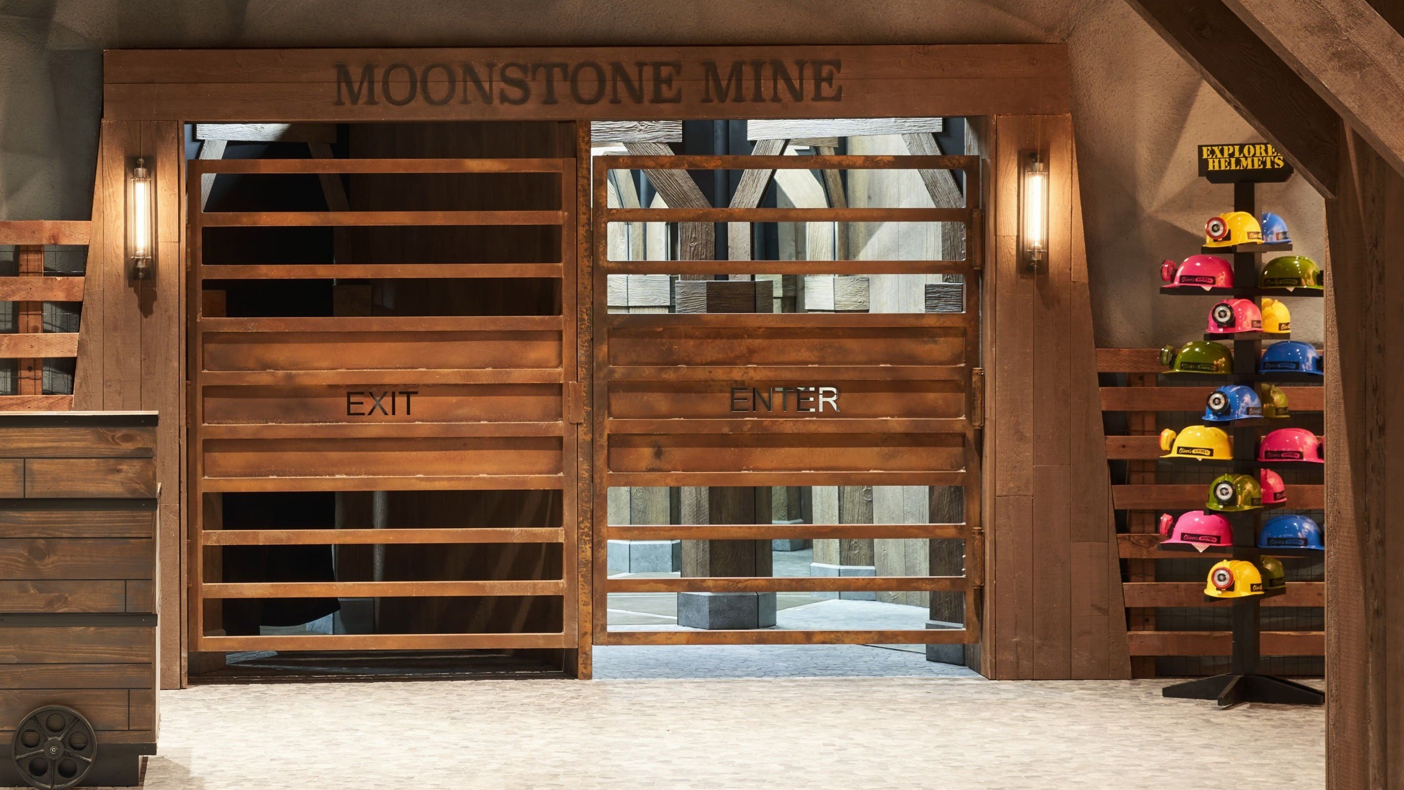 Entrance to Moonstone Mine with colorful helmets display