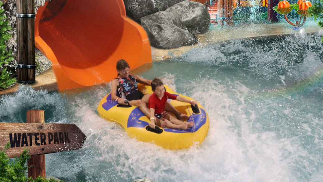 mother and son on a water slide