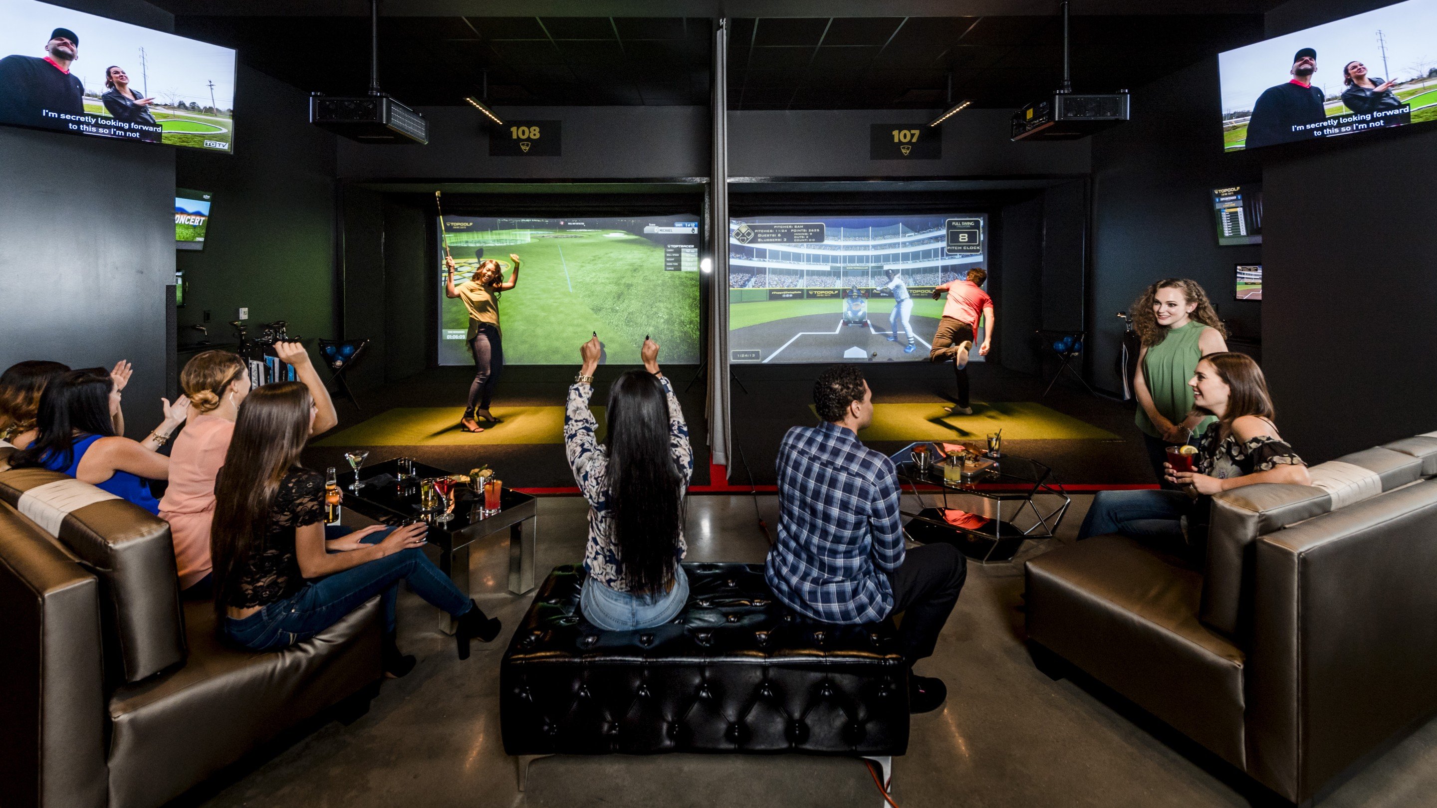 Group enjoying virtual sports in lounge