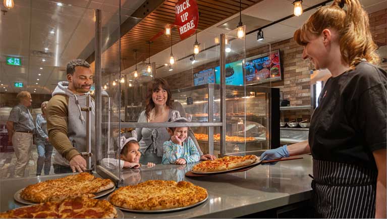 Family of four ordering pizza