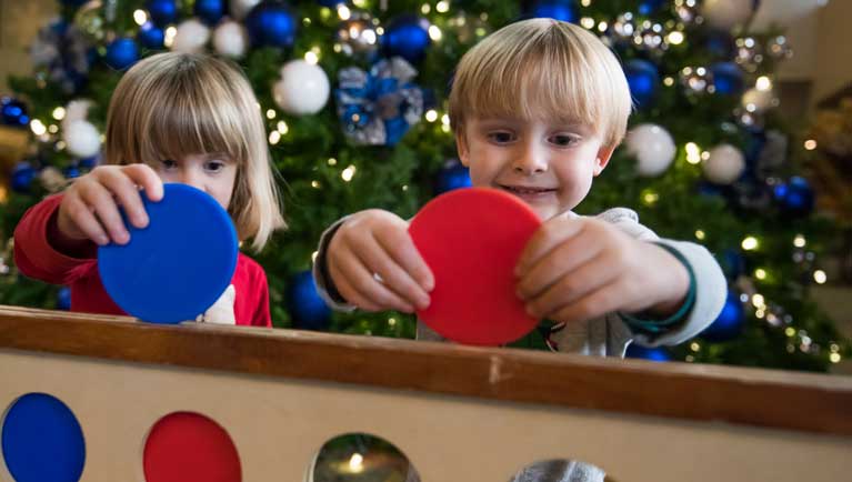 boy and girl playing connect4 